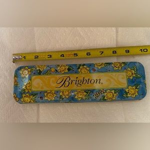Brighton Rectangular Tin. Approximately 9-1/2” x 3” x 1”. See pictures.
